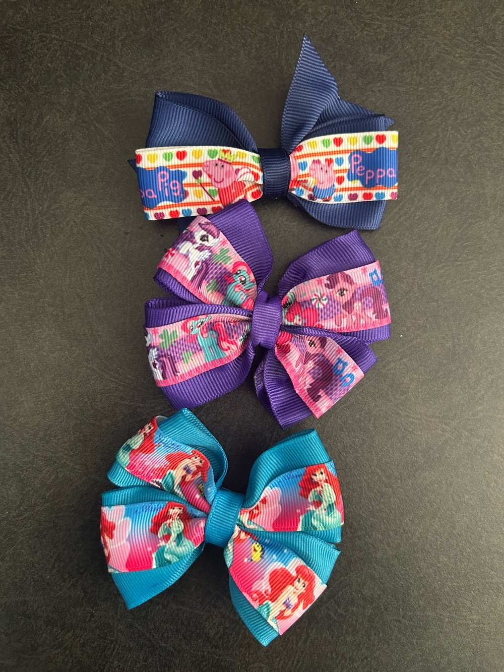 Character-themed hair bows for little girls
